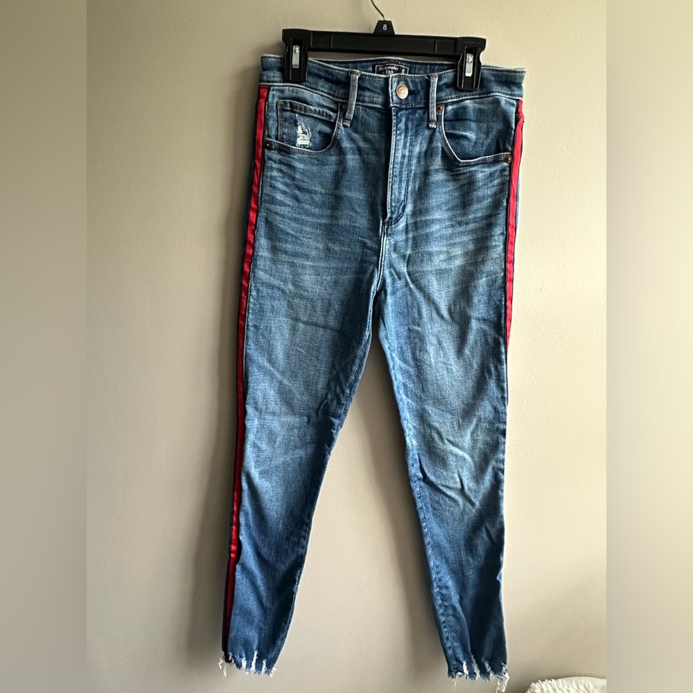 Abercrombie and Fitch, skinny jeans with red strip